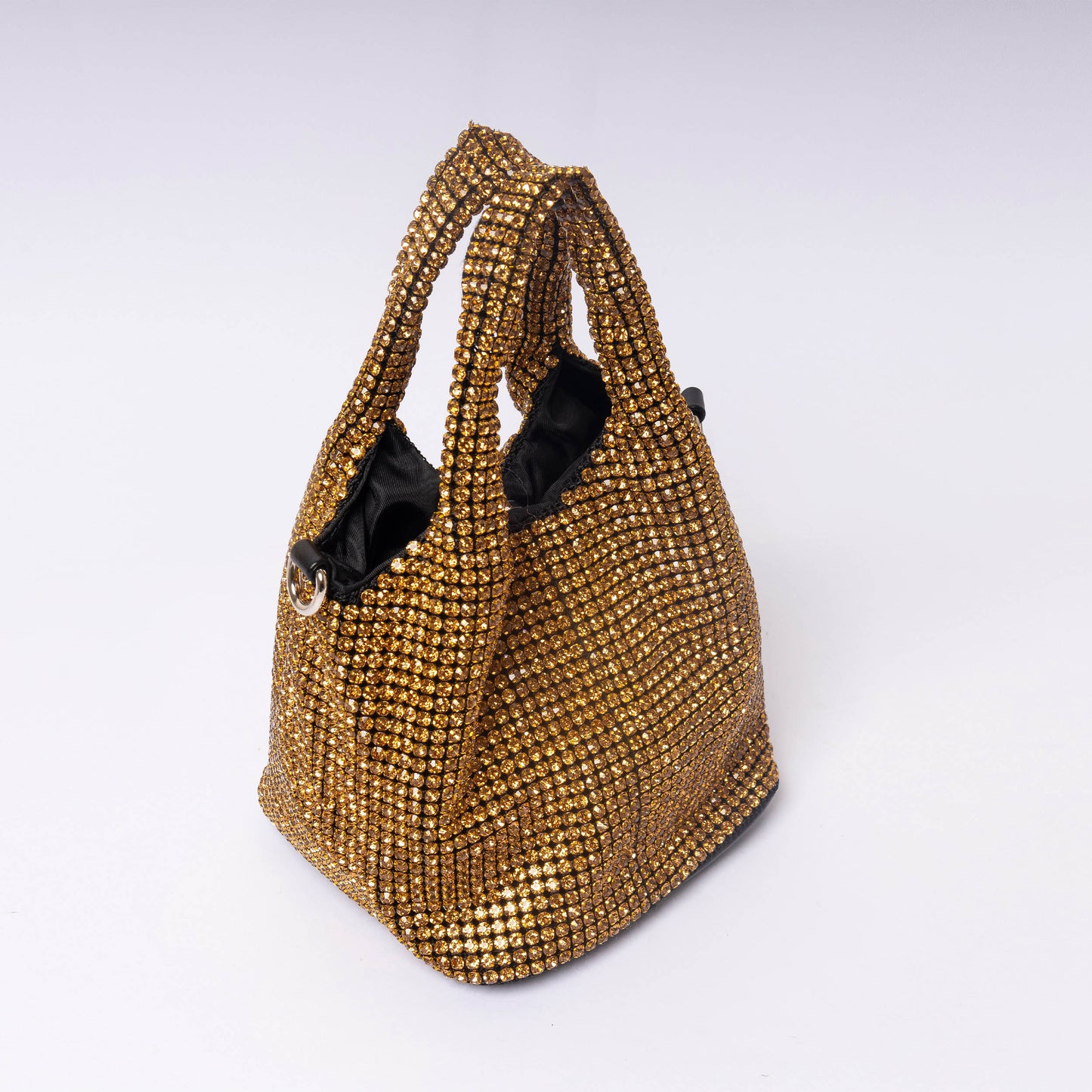 Celéste Crystal champagne radiance rhinestone detail close-up LUMINA evening bag