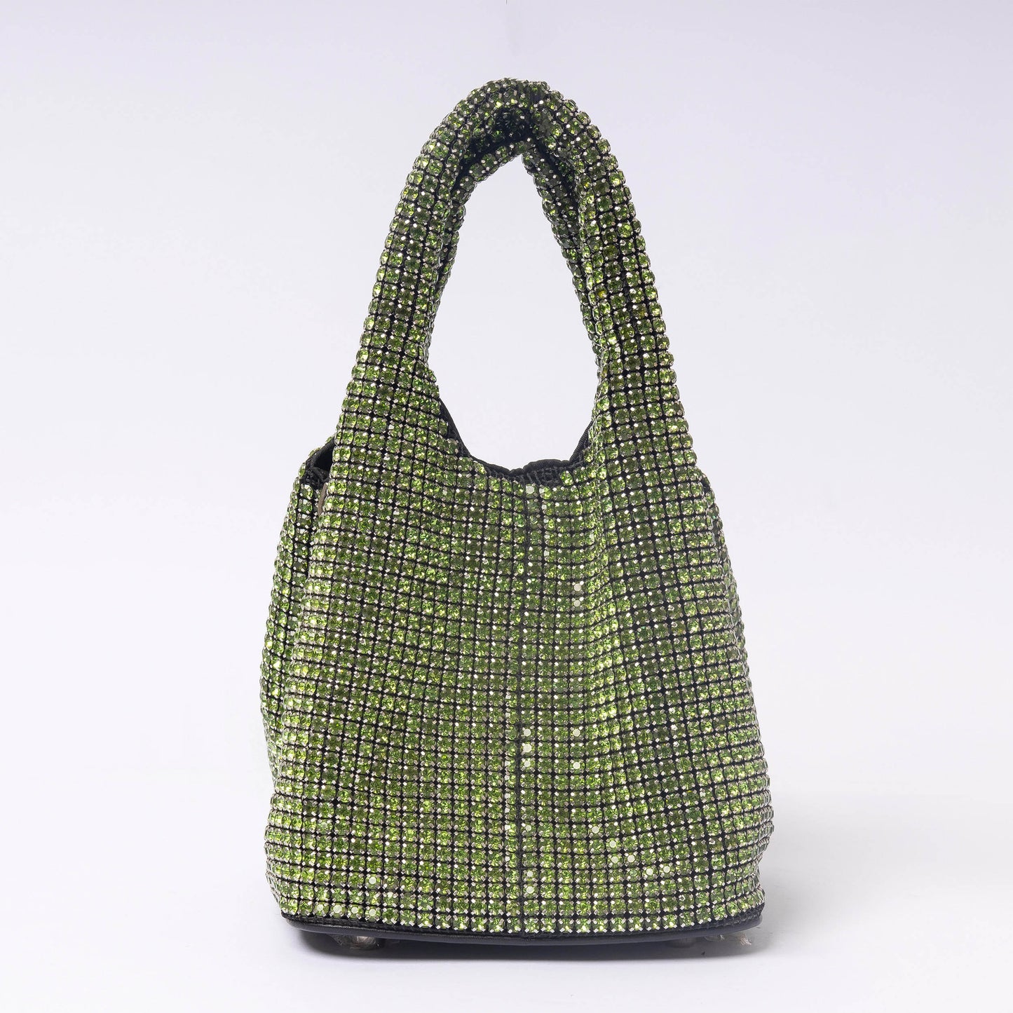 Celéste Crystal emerald glow rhinestone detail close-up LUMINA evening clutch