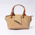 "Avérie Knot Bag Caramel Taupe luxury vegan leather handbag with signature knot detail | LUMINA"
