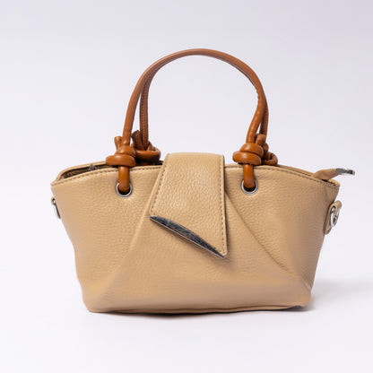 "Avérie Knot Bag Caramel Taupe luxury vegan leather handbag with signature knot detail | LUMINA"
