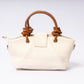 "Avérie Knot Bag Ivory Cream interior compartment and pockets"
