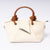 "Avérie Knot Bag Ivory Cream luxury cream vegan leather handbag with signature knot detail | LUMINA"
