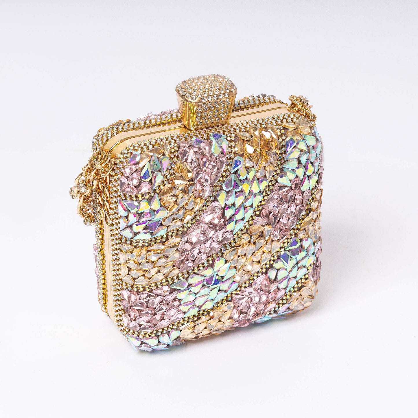 Elára Luxe blush gold clutch detail close-up LUMINA premium evening handbag

