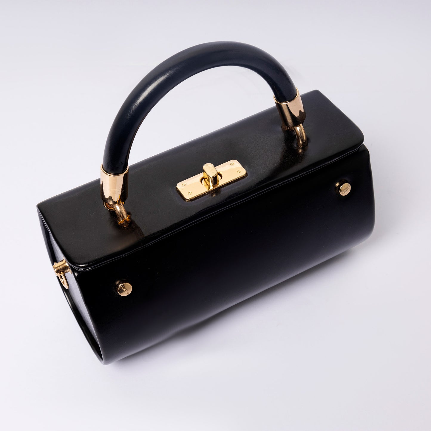 Elùra Noir Luxe adjustable strap and gold hardware detail"
